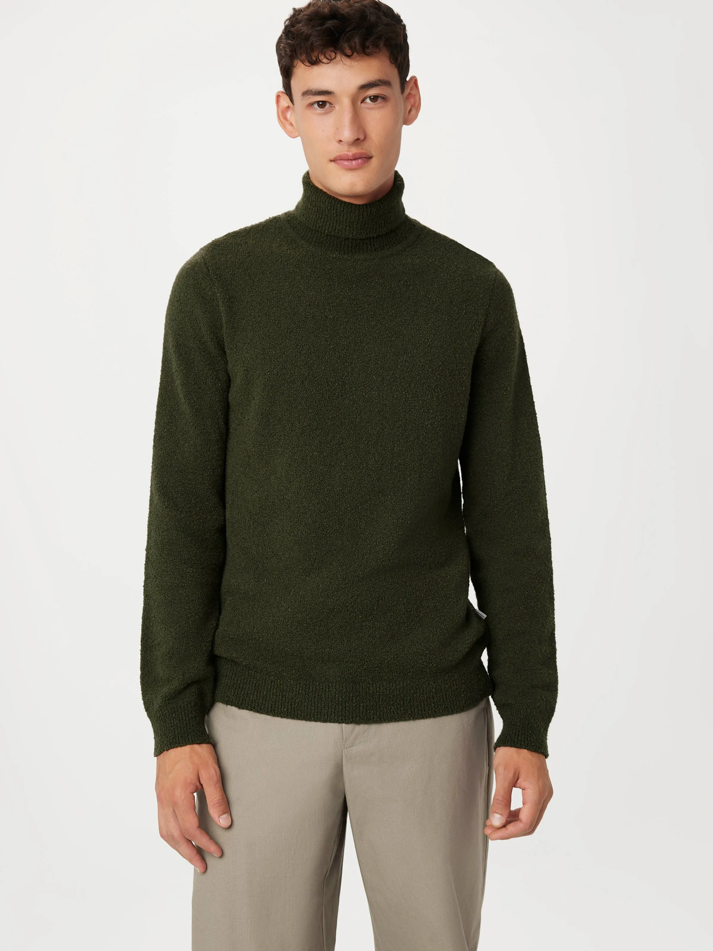 The Seawool Boucle Turtleneck in Dark Green