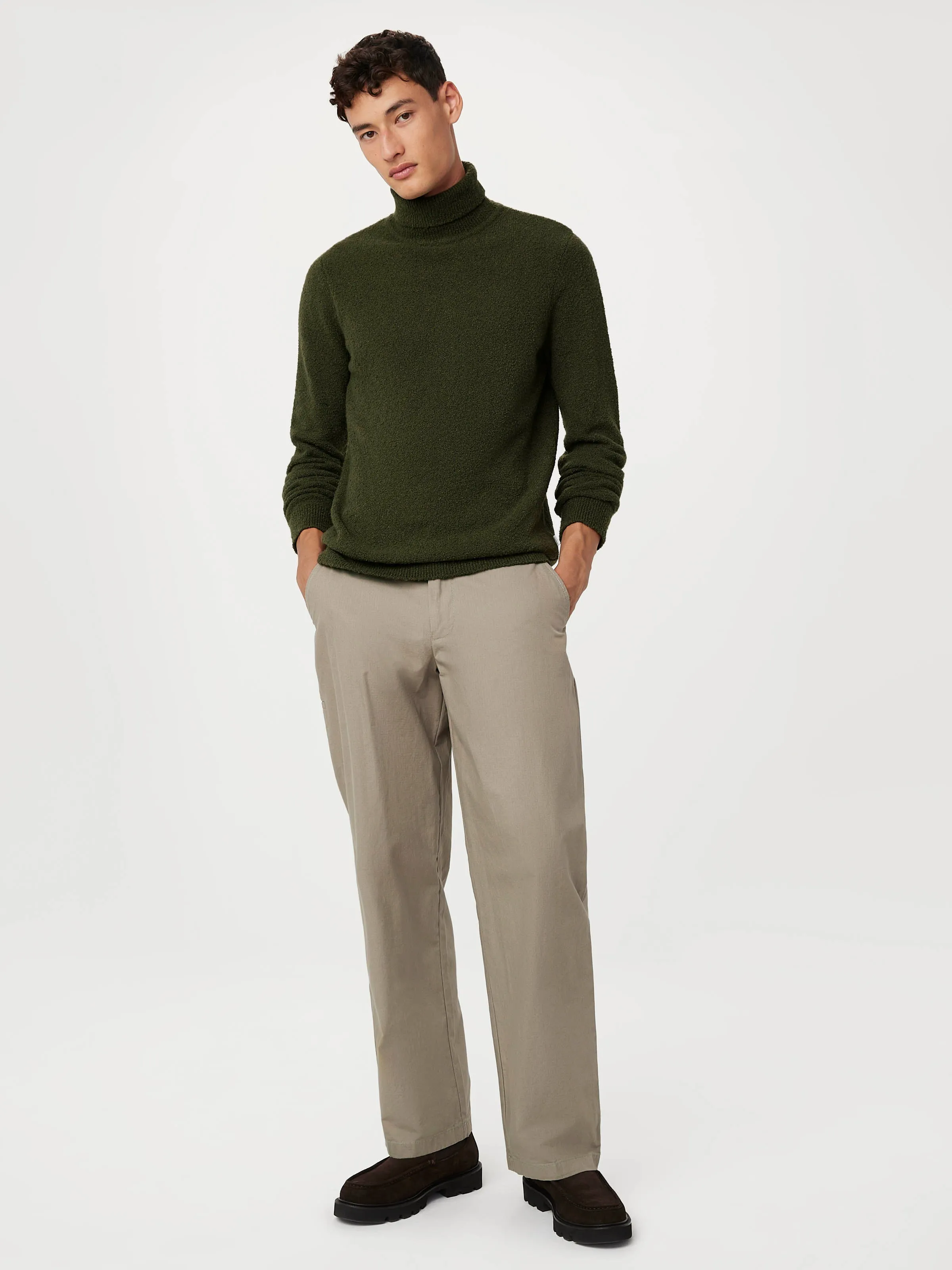 The Seawool Boucle Turtleneck in Dark Green