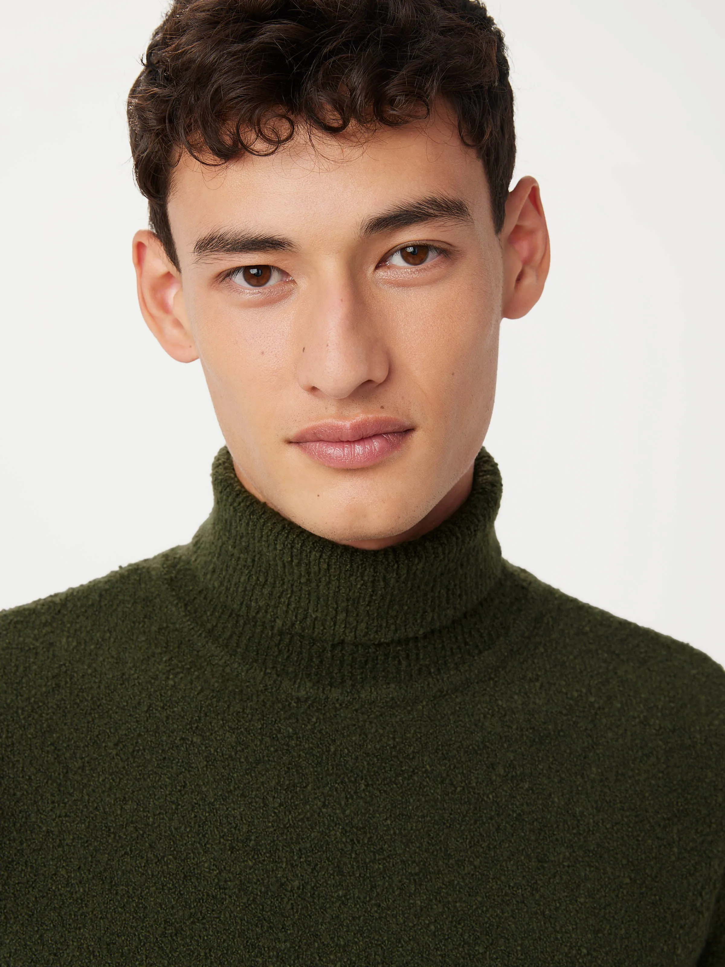 The Seawool Boucle Turtleneck in Dark Green